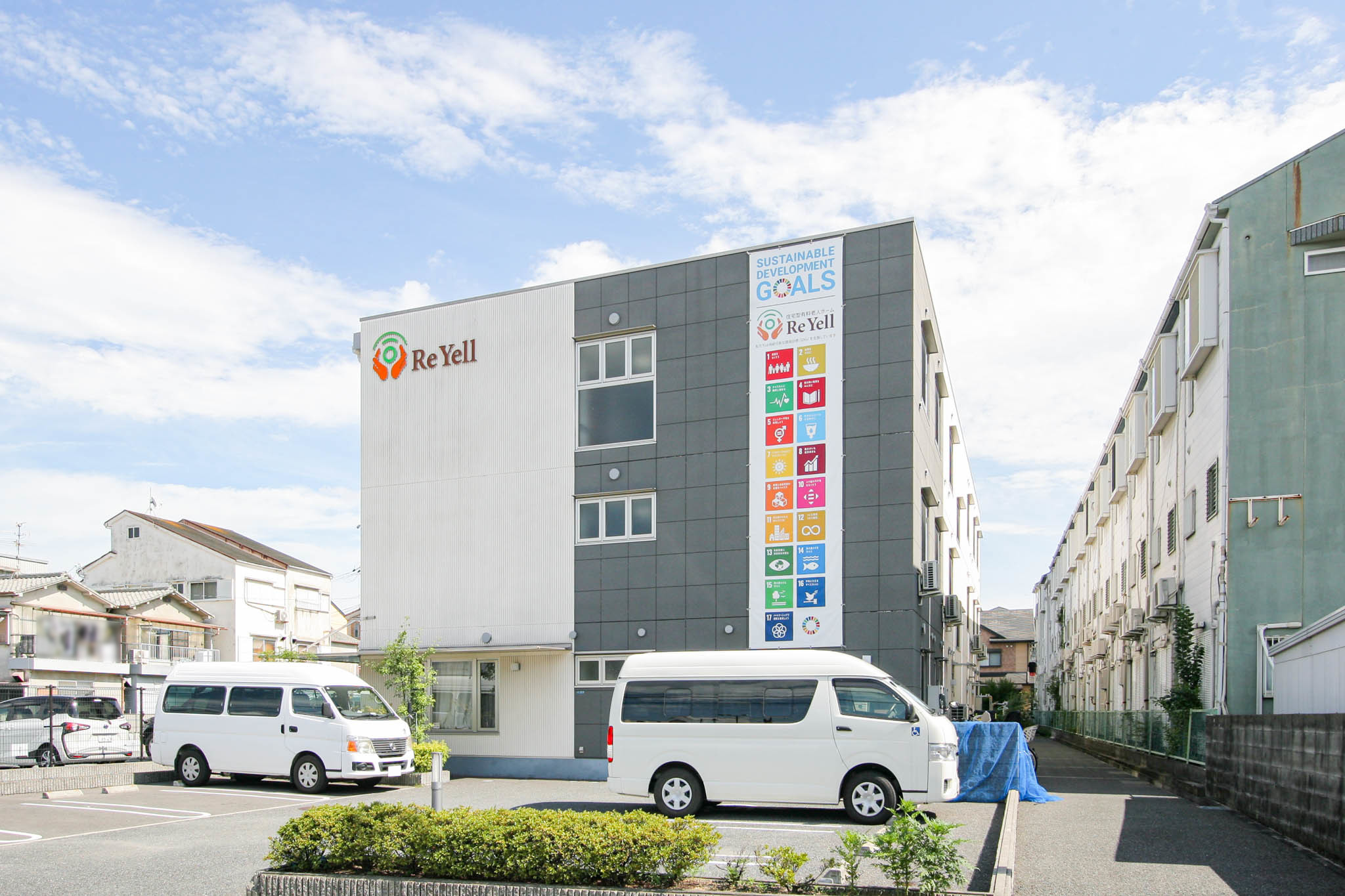 リ・エール沖町の玄関